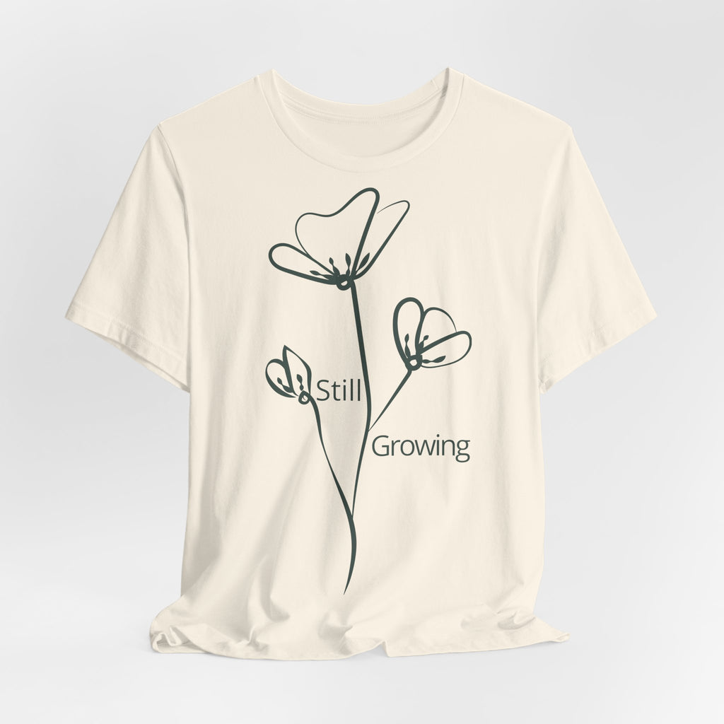 Still Growing Floral T-Shirt by Printify featuring a minimalist floral design on a comfortable casual tee.