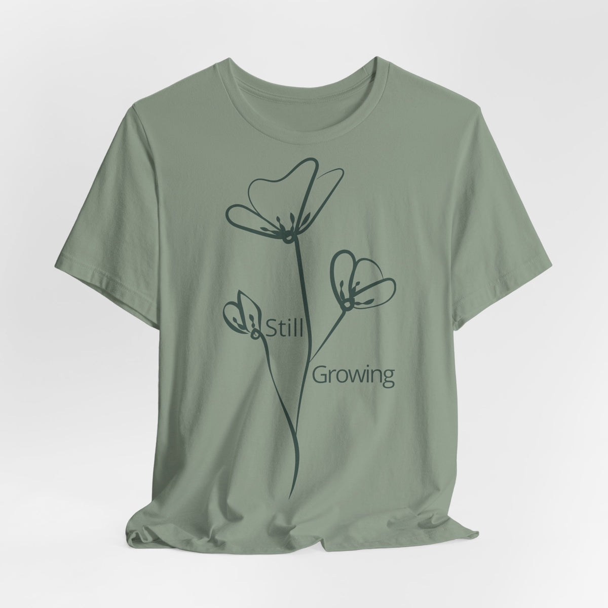 Still Growing Floral T-Shirt by Printify featuring a minimalist floral design on a casual, comfortable T-shirt.
