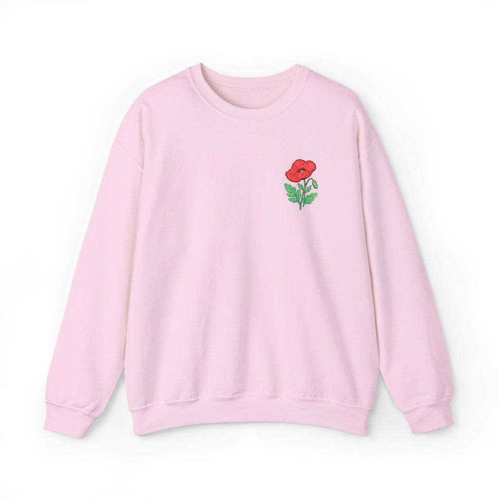 Unisex embroidered sweatshirt with floral poppy design on the left chest, featuring a comfortable fit and cozy fabric.