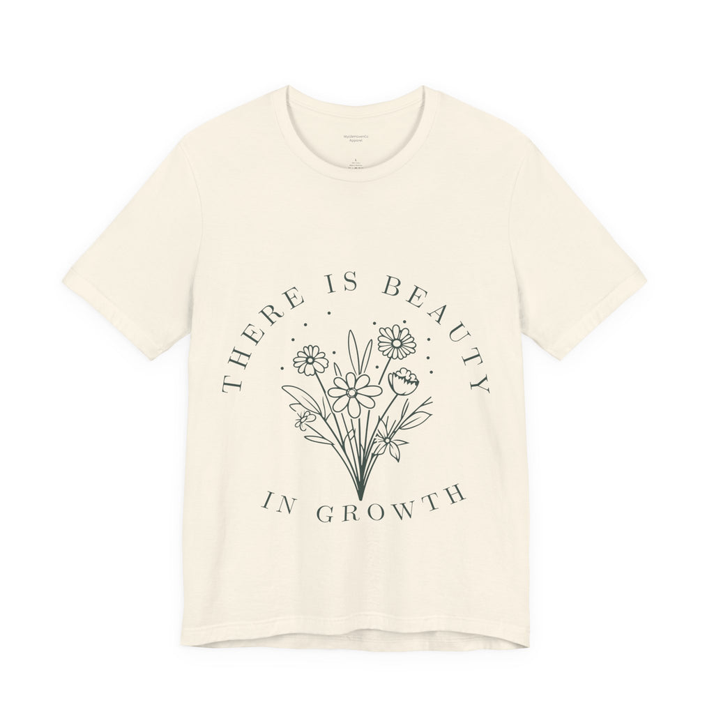 Printify floral T-shirt titled "There Is Beauty In Growth" featuring colorful botanical design on soft cotton fabric.