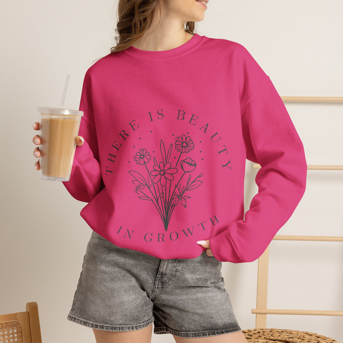Cream crewneck sweatshirt with "There Is Beauty in Growth" floral minimalist design, printed by Printify.