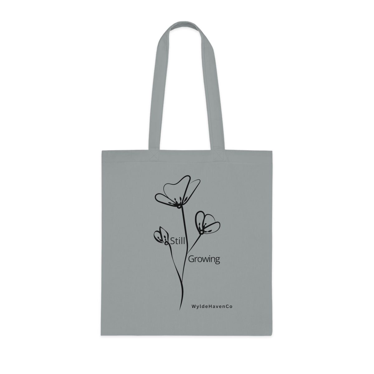 Still Growing floral cotton tote bag by Printify featuring a minimalist inspirational design and durable fabric.
