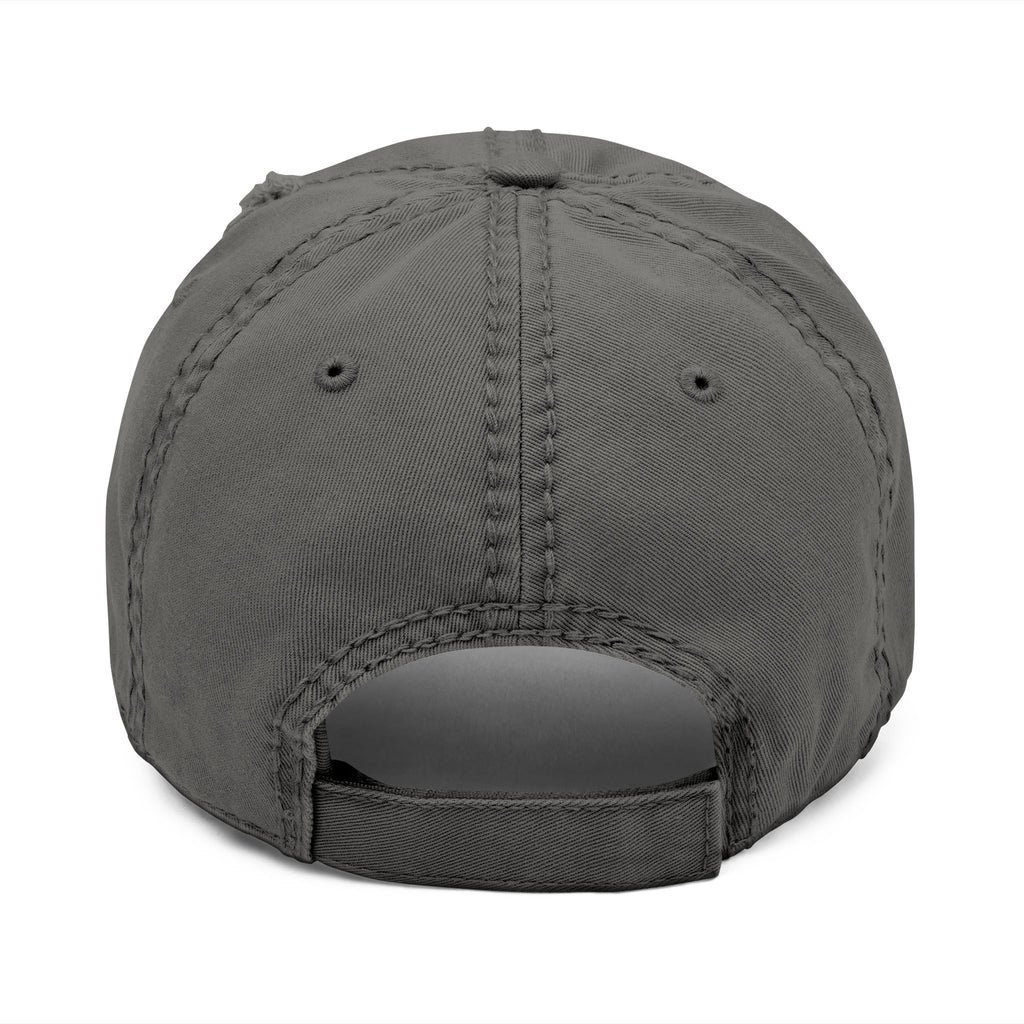 Distressed embroidered dad hat featuring vintage washed baseball cap style by Printify, showing worn fabric and detailed embroidery.