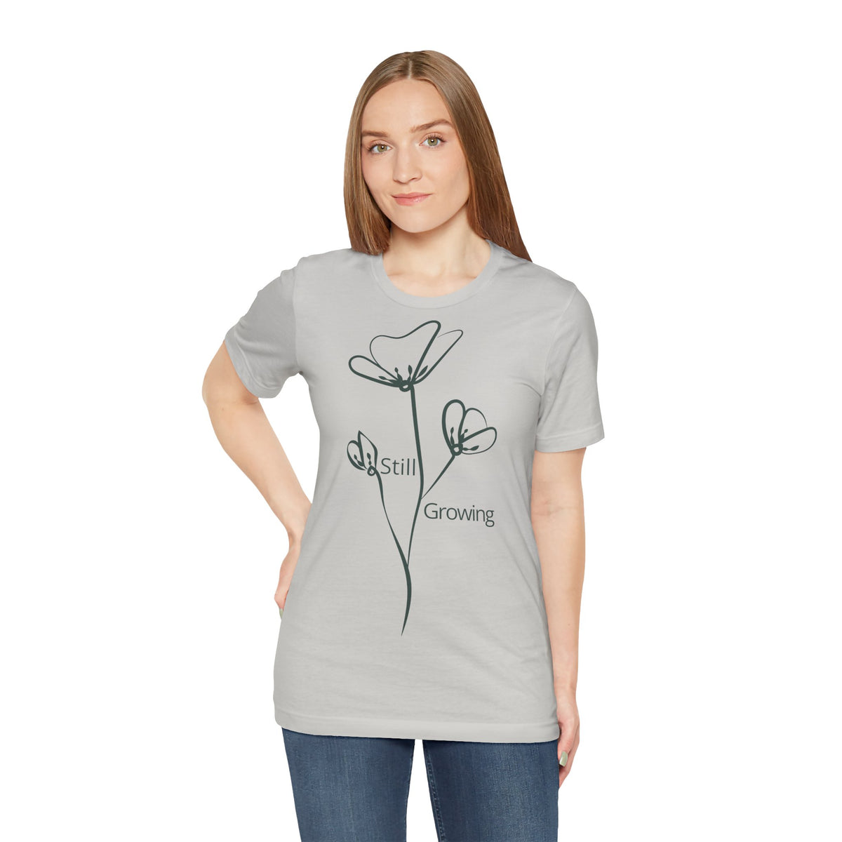 Still Growing floral T-shirt by Printify featuring a minimalist inspirational design on a comfortable cotton tee.