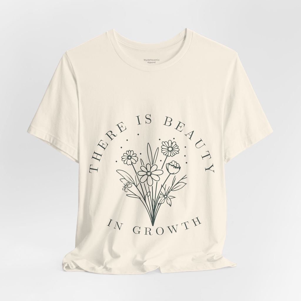 Printify floral T-shirt featuring a colorful "There Is Beauty In Growth" design on soft fabric, front view.