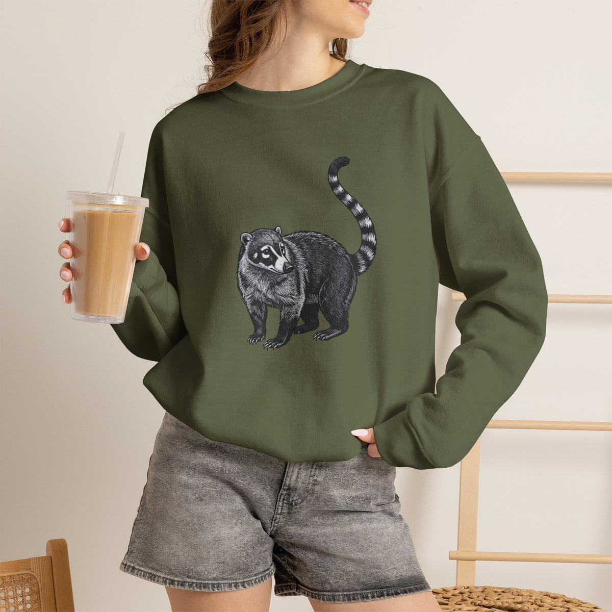 Coati graphic sweatshirt from Wyldelife Collection featuring detailed wildlife art on a comfortable Printify sweatshirt.