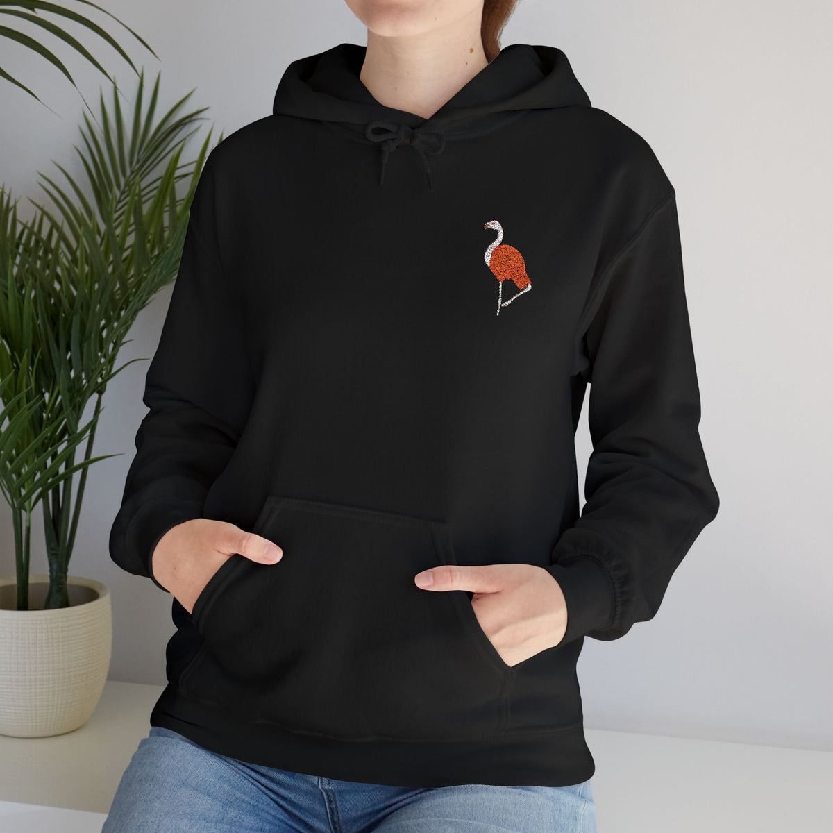 Unisex Flamingo embroidered hoodie with wildlife embroidery from Wyldelife Collection by Printify, featuring colorful flamingo design.