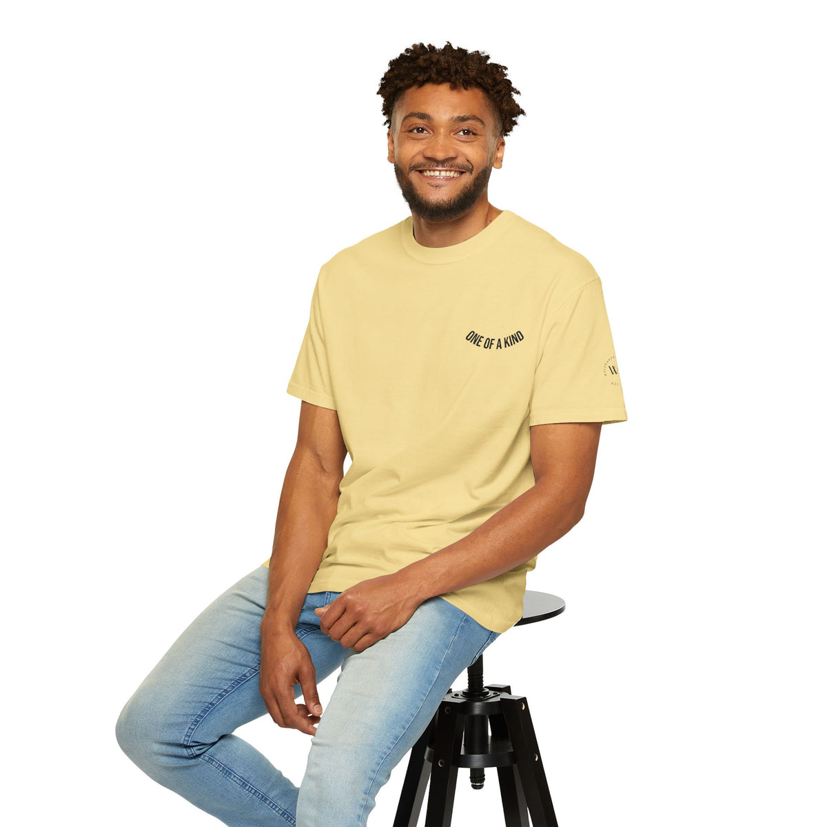 Black "One of a Kind" Chest Logo T-Shirt by Printify featuring a centered logo on soft cotton fabric.