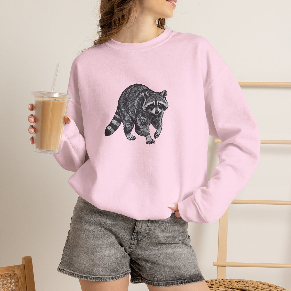 Raccoon graphic sweatshirt from Wyldelife Collection featuring original wildlife art on a comfortable Printify sweatshirt.