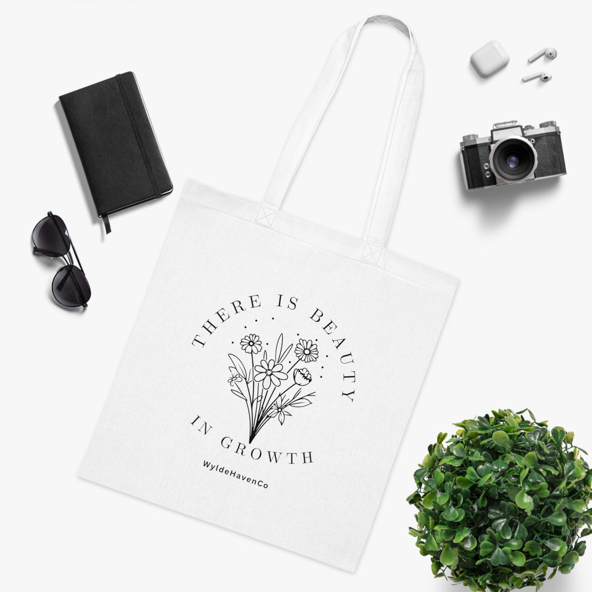 Floral cotton tote bag with "There Is Beauty In Growth" print, stylish reusable bag for daily use, by Printify