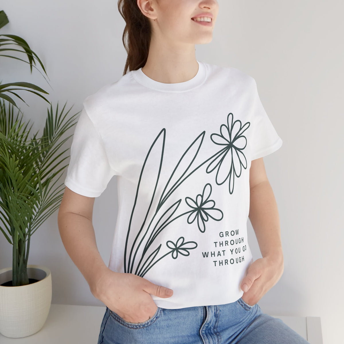 Floral graphic T-shirt with inspirational quote "Grow Through What You Go Through" by Printify, casual fashion tee.
