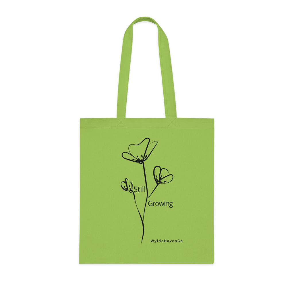 Still Growing floral cotton tote bag by Printify featuring a minimalist design with inspirational floral artwork.
