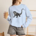Iguana graphic sweatshirt from Wyldelife Collection by Printify featuring wildlife art on a casual sweatshirt.