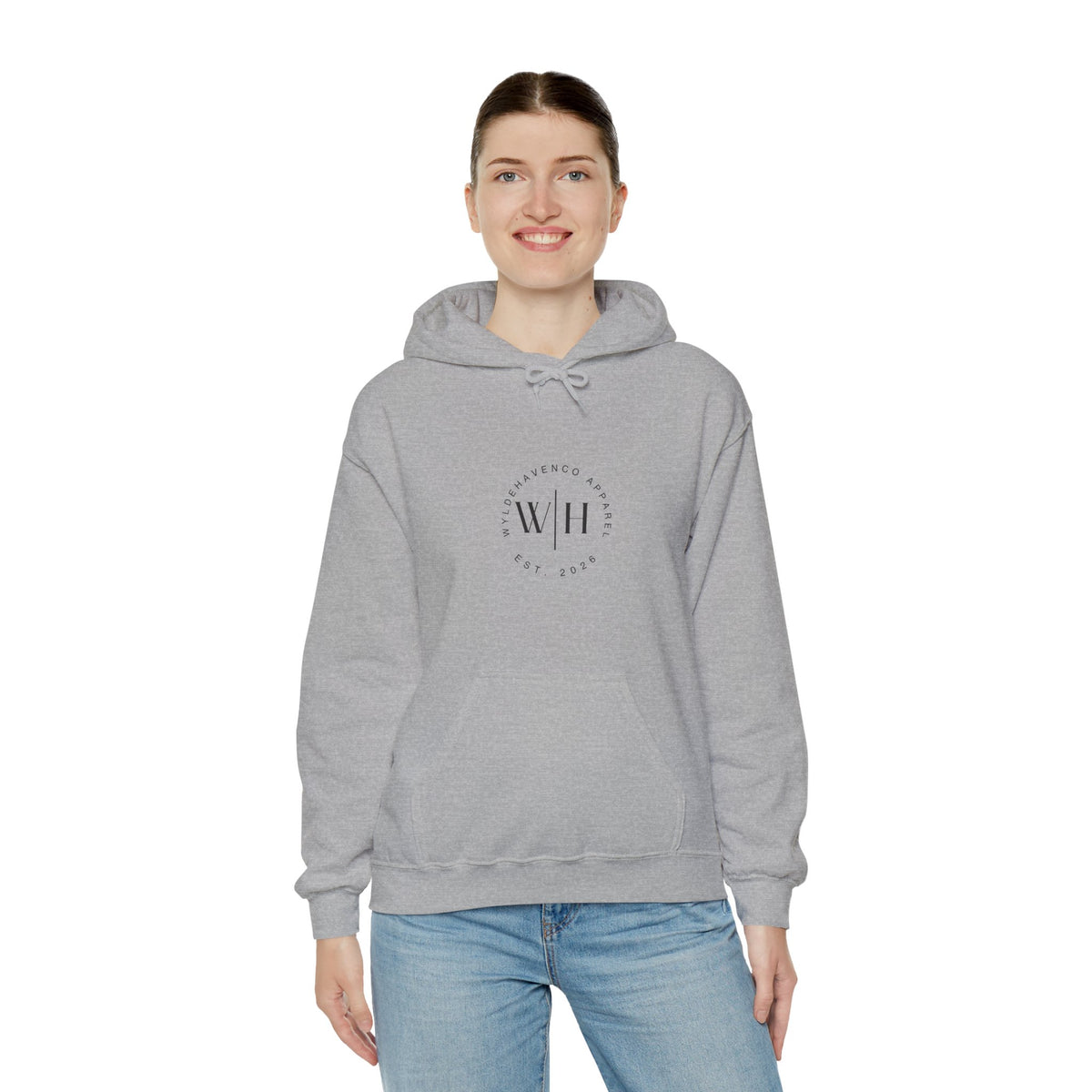 Gray hoodie featuring a Monogram Circle WyldeHaven Apparel Est. 2026 logo print on the front, casual sweatshirt style.