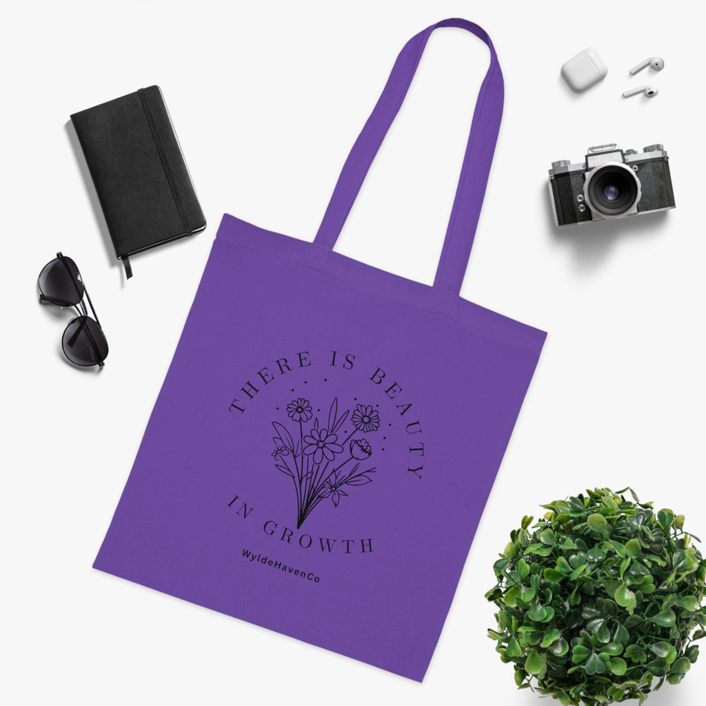 Floral cotton tote bag with "There Is Beauty In Growth" slogan, stylish and eco-friendly bag by Printify.