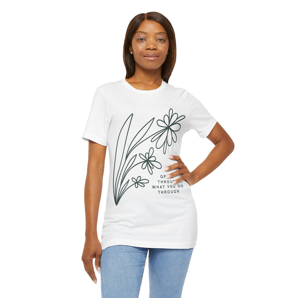 Floral inspirational graphic T-shirt by Printify featuring the phrase "Grow Through What You Go Through" on a casual cotton tee.