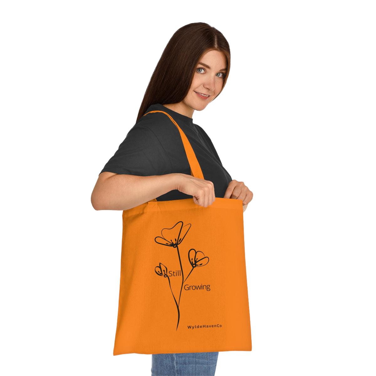 Still Growing floral cotton tote bag by Printify featuring minimalist floral design and sturdy fabric for everyday use.
