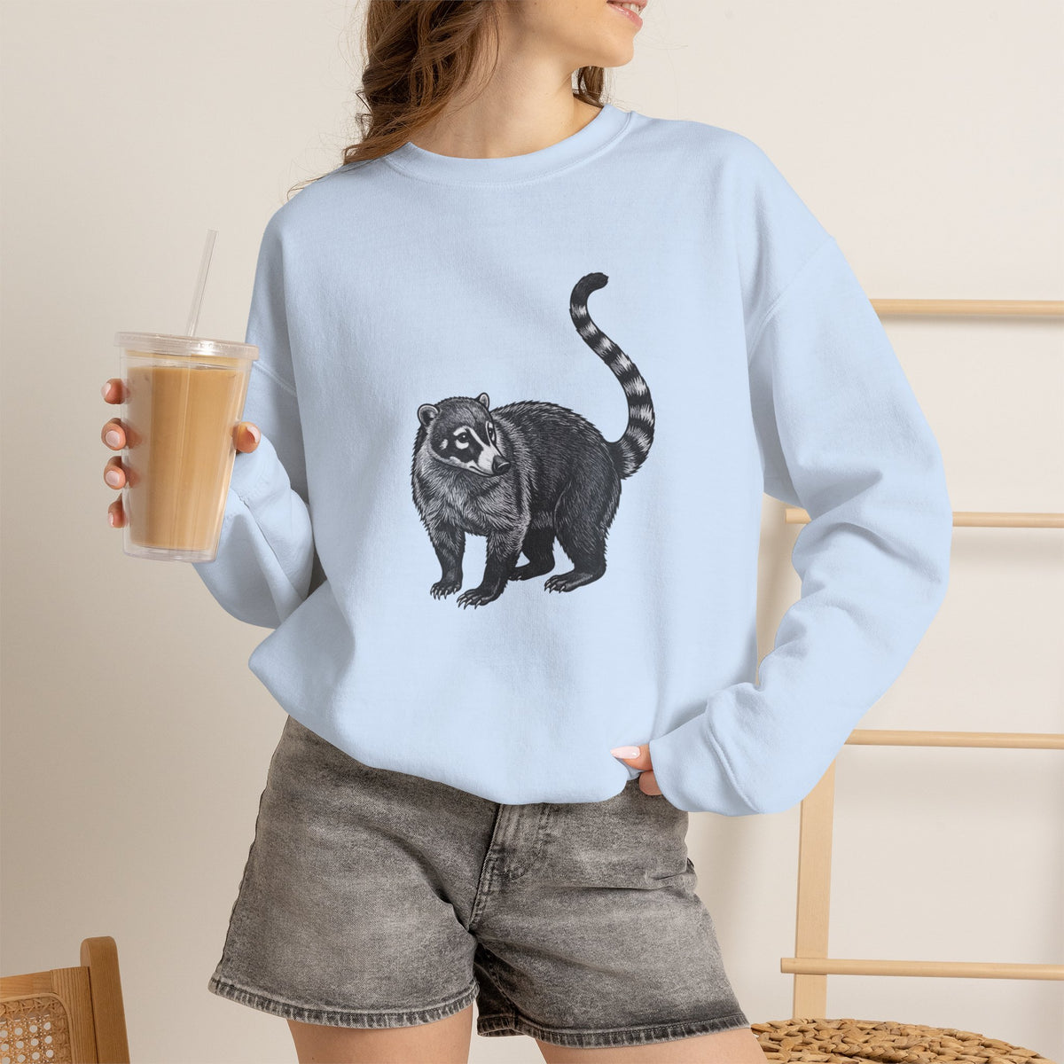 Gray Coati graphic sweatshirt from Wyldelife Collection featuring wildlife art, printed by Printify, with a detailed coati illustration.