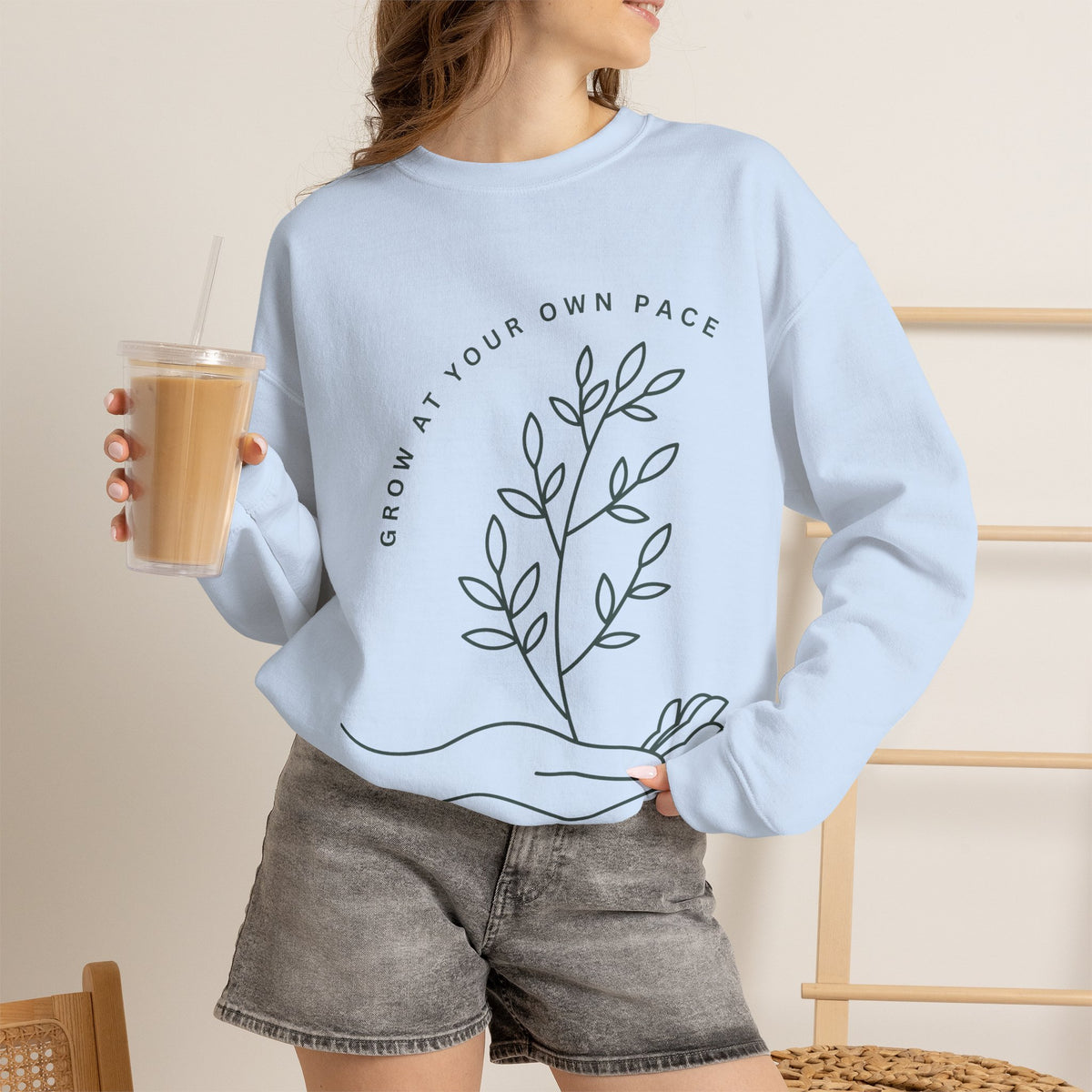 Printify Grow At Your Own Pace crewneck sweatshirt featuring minimalist line art on soft, comfortable fabric.