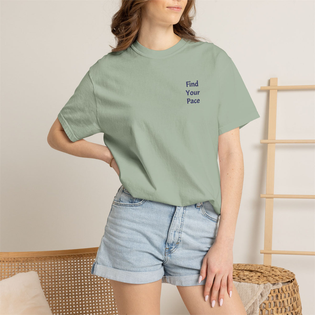 Black Find Your Pace T-Shirt by Printify featuring a minimal motivational chest print on soft cotton fabric.