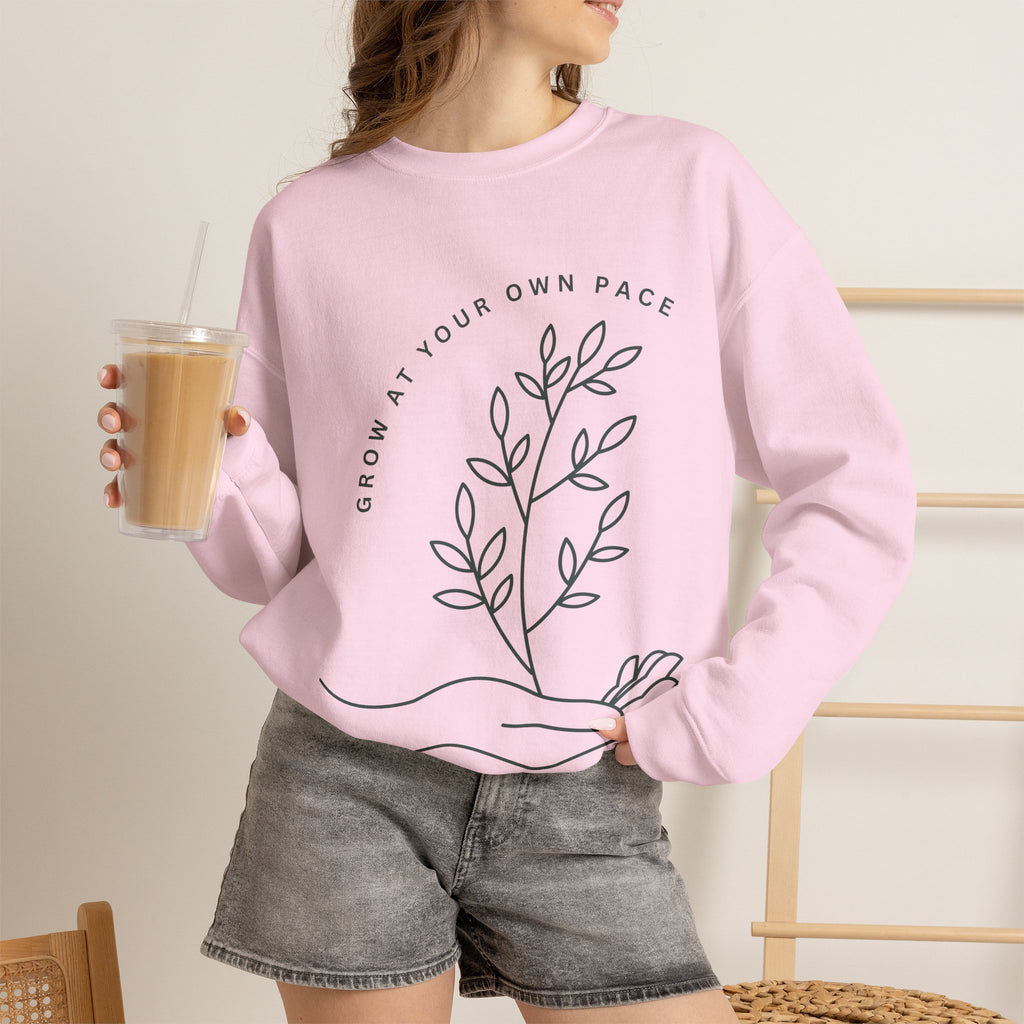 Printify Grow At Your Own Pace minimalist line art crewneck sweatshirt, soft fabric with simple design on a neutral background.