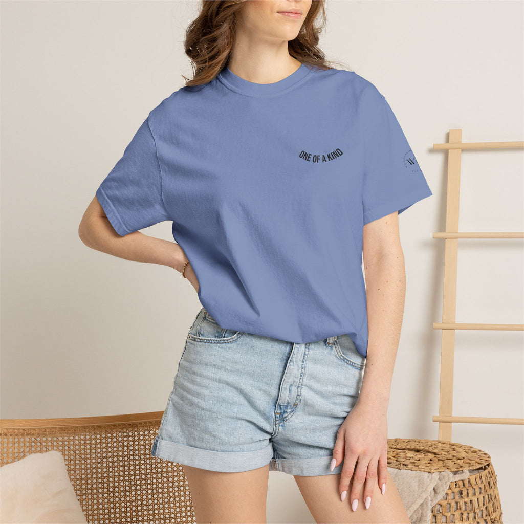 Black "One of a Kind" Chest Logo T-Shirt by Printify featuring a minimalist chest logo design on soft cotton fabric.