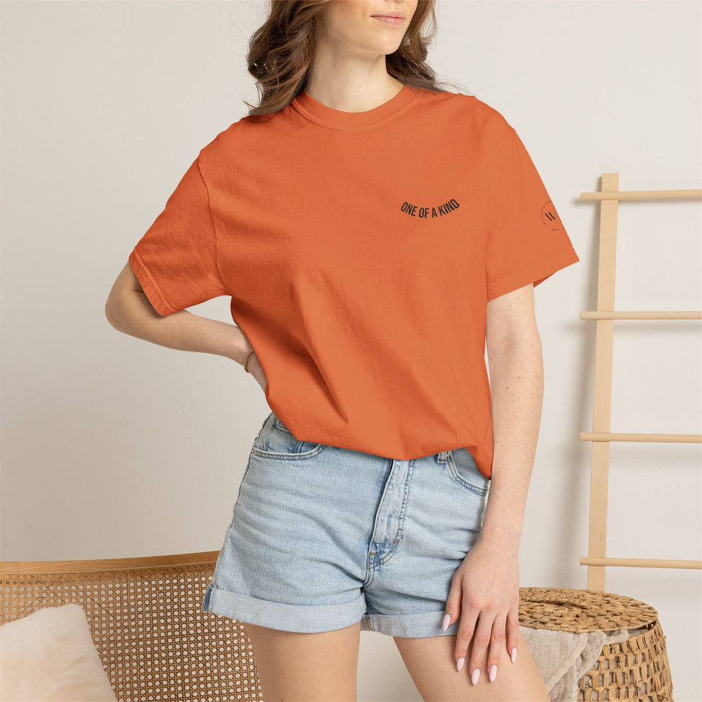 Black "One of a Kind" Chest Logo T-shirt by Printify featuring a minimalist front logo design.
