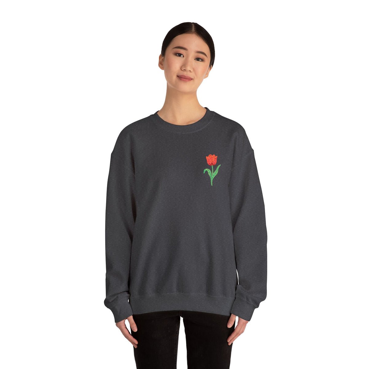 Unisex embroidered tulip sweatshirt by Printify featuring floral design on the left chest, made of soft fabric.