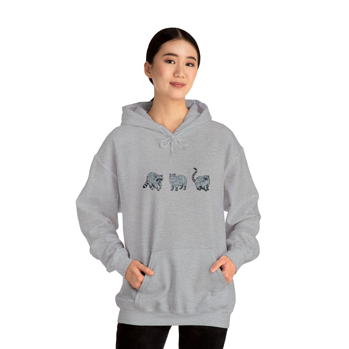 Wyldelife Trio embroidered hoodie by Printify featuring raccoon, capybara, and coati animal designs on a cozy hoodie.