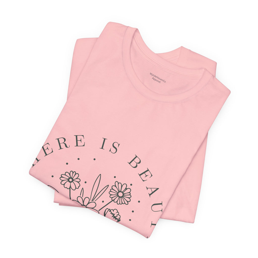 Printify "There Is Beauty In Growth" floral T-shirt with a vibrant botanical design on soft fabric.