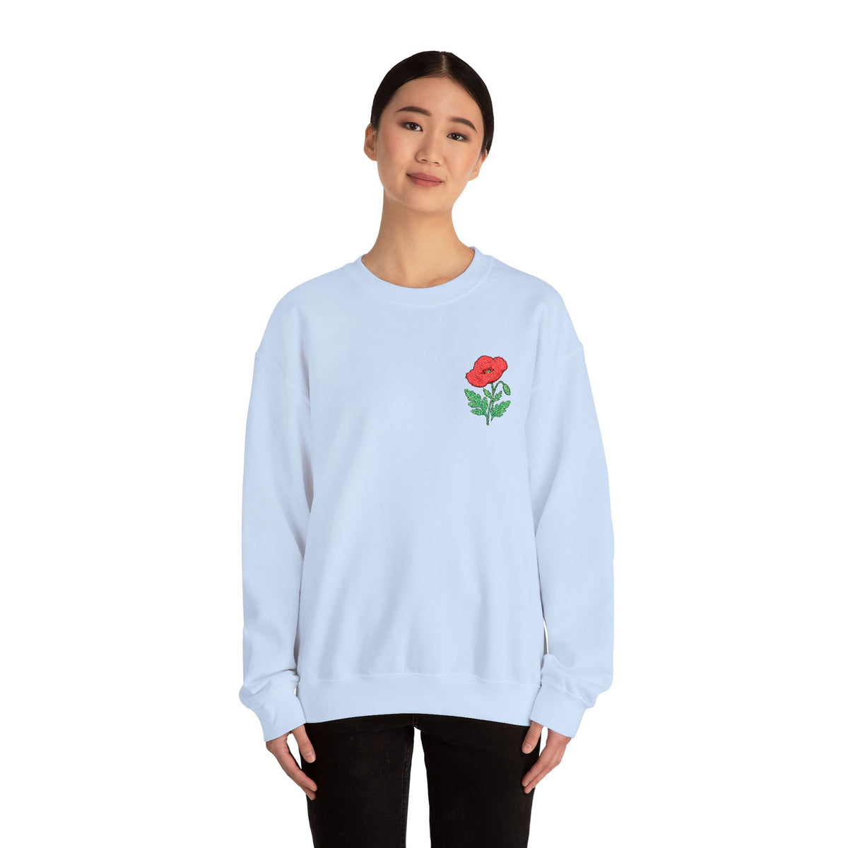 Unisex embroidered sweatshirt with floral poppy design on the left chest, in a cozy casual style by Printify.