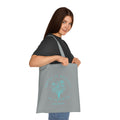 Floral cotton tote bag with "There Is Beauty In Growth" quote, eco-friendly reusable bag by Printify with vibrant floral design.