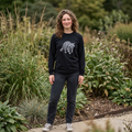 Raccoon long sleeve wildlife graphic T-shirt from WyldeLife Collection by Printify, featuring a detailed raccoon illustration.