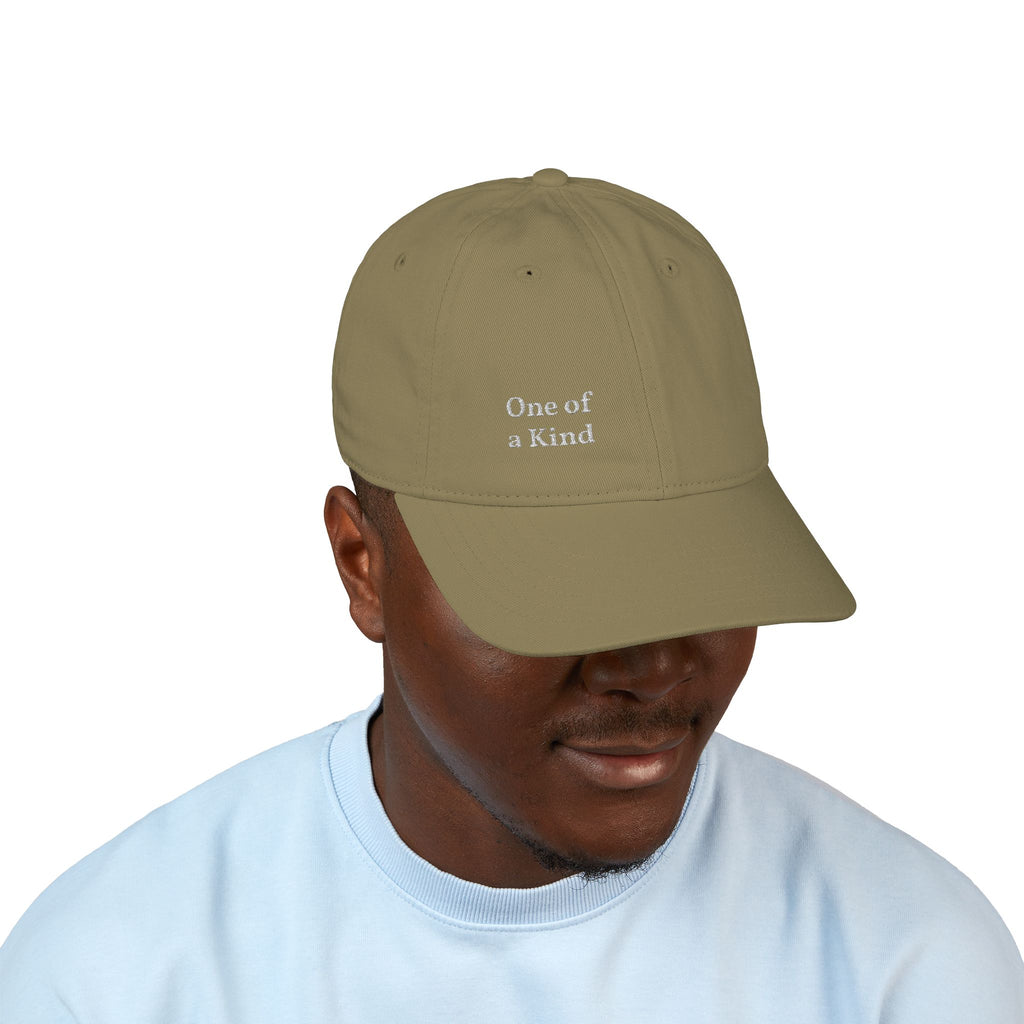 Organic embroidered baseball cap by Printify featuring a minimal casual design with "One of a Kind" lettering.