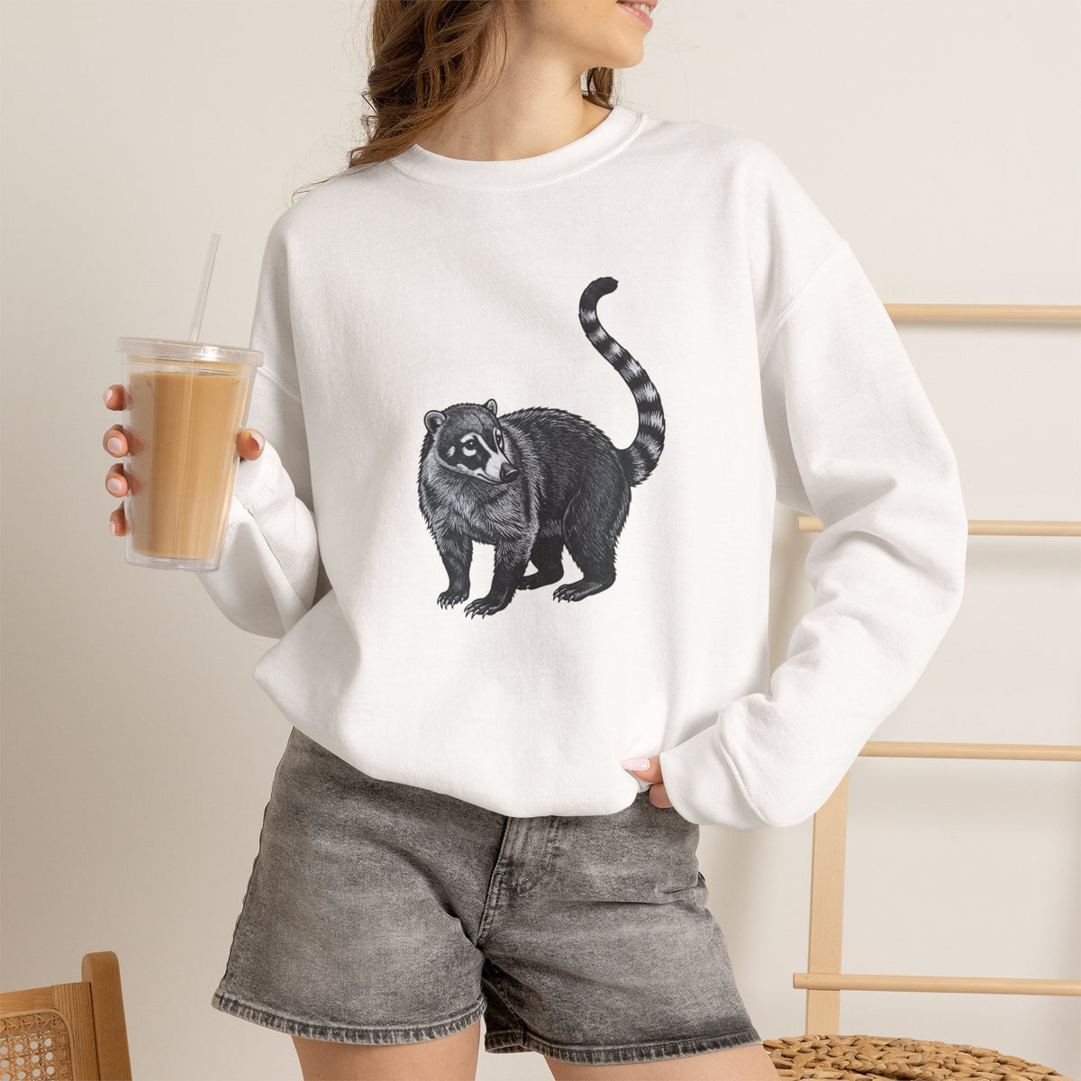 Coati graphic sweatshirt from Wyldelife Collection featuring wildlife art on a comfortable Printify sweatshirt.