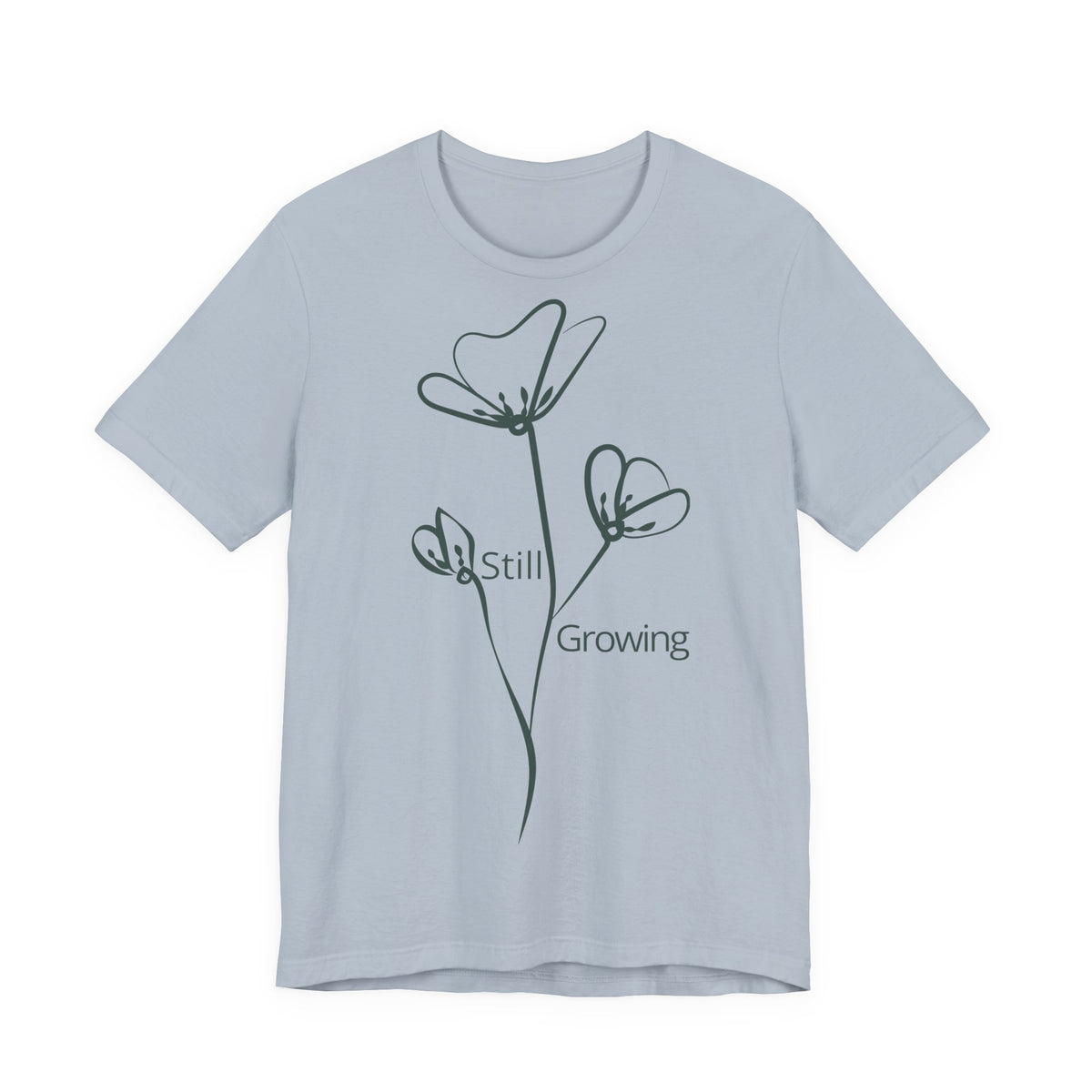 Still Growing Floral T-Shirt by Printify featuring a minimalist inspirational design with colorful floral artwork on a casual tee