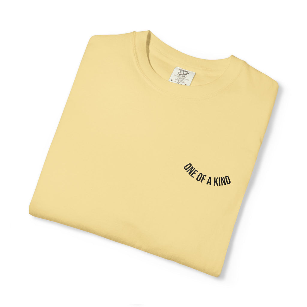 Black "One of a Kind" chest logo T-shirt by Printify, featuring a minimalist design and comfortable cotton fabric.