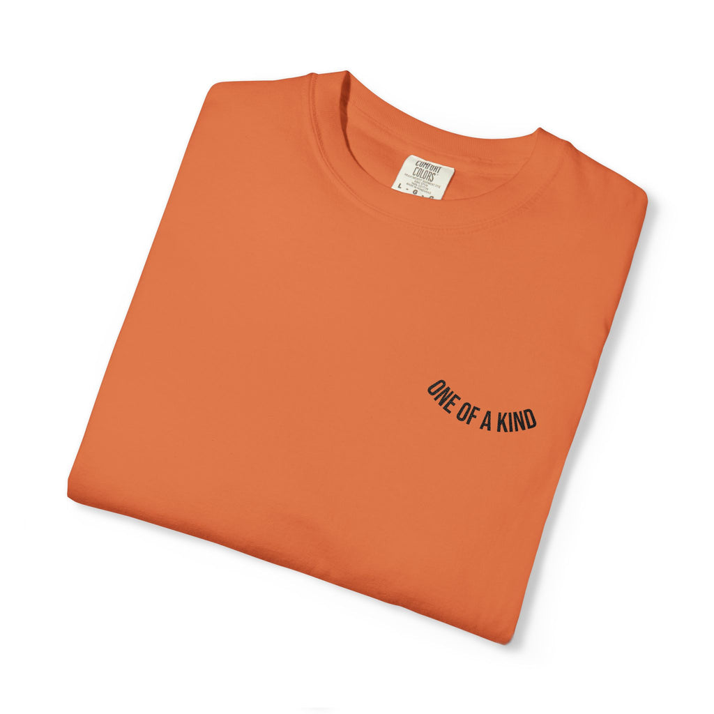 Black "One of a Kind" Chest Logo T-shirt by Printify featuring a small logo print on the front chest area.