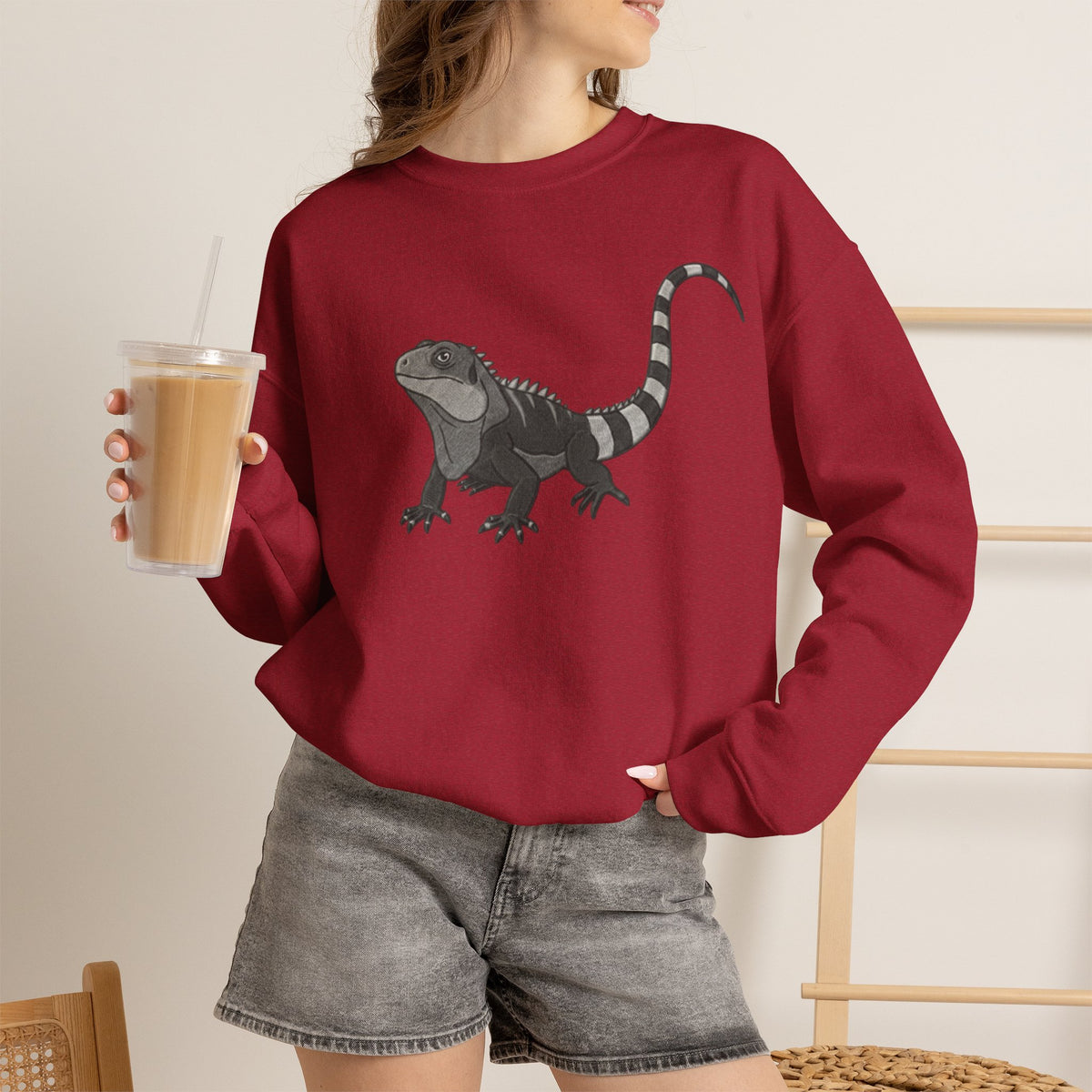 Iguana graphic sweatshirt from Wyldelife Collection featuring colorful wildlife art on a cozy Printify sweatshirt.