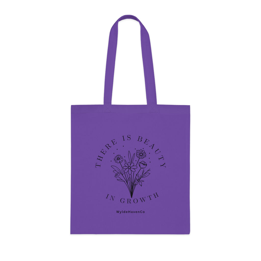 Floral cotton tote bag with "There Is Beauty In Growth" quote from Printify, showcasing durable fabric and vibrant design.