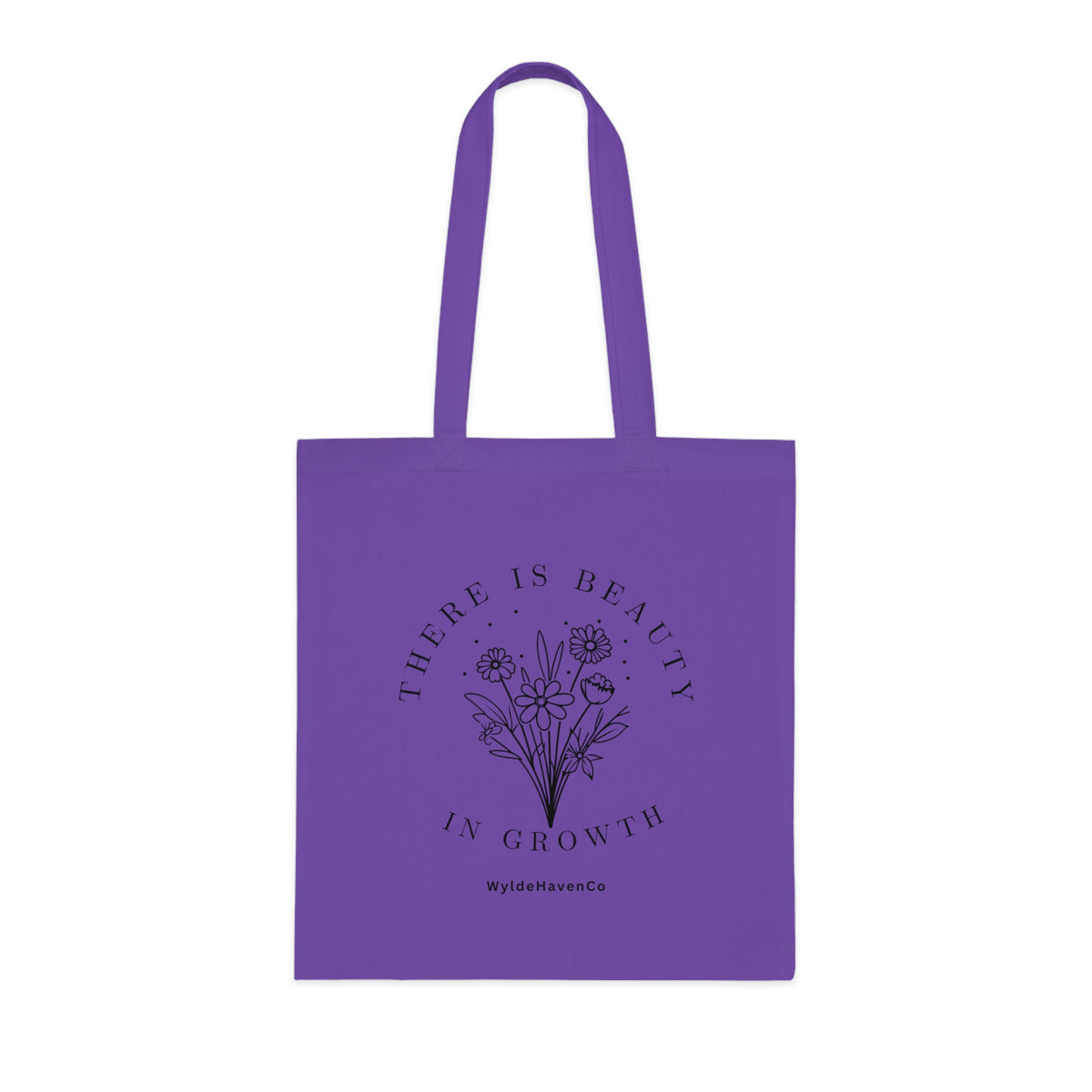 Floral cotton tote bag with "There Is Beauty In Growth" quote from Printify, showcasing durable fabric and vibrant design.