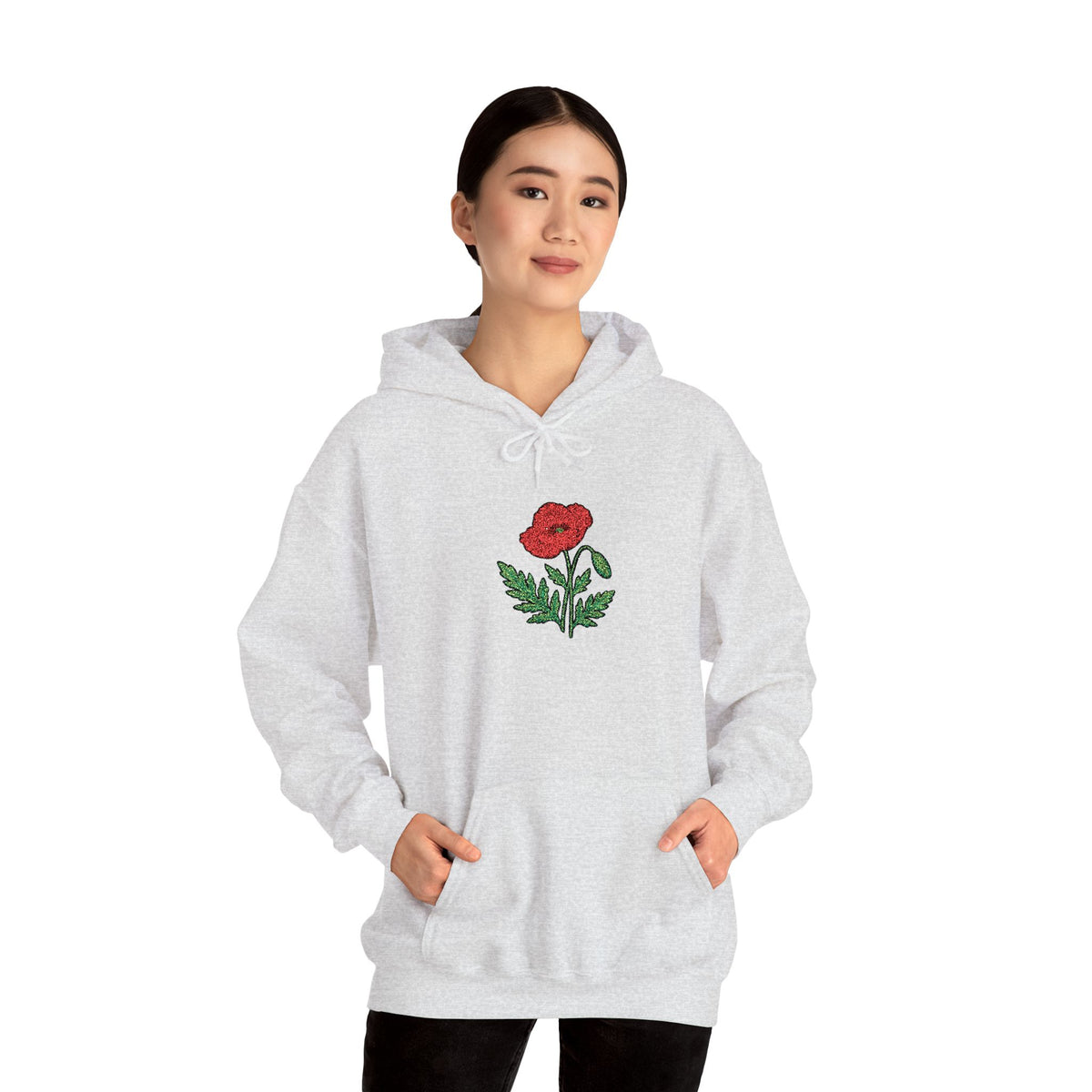 Red hoodie with embroidered red poppy floral design on the front, by Printify, showcasing detailed embroidery and casual style.