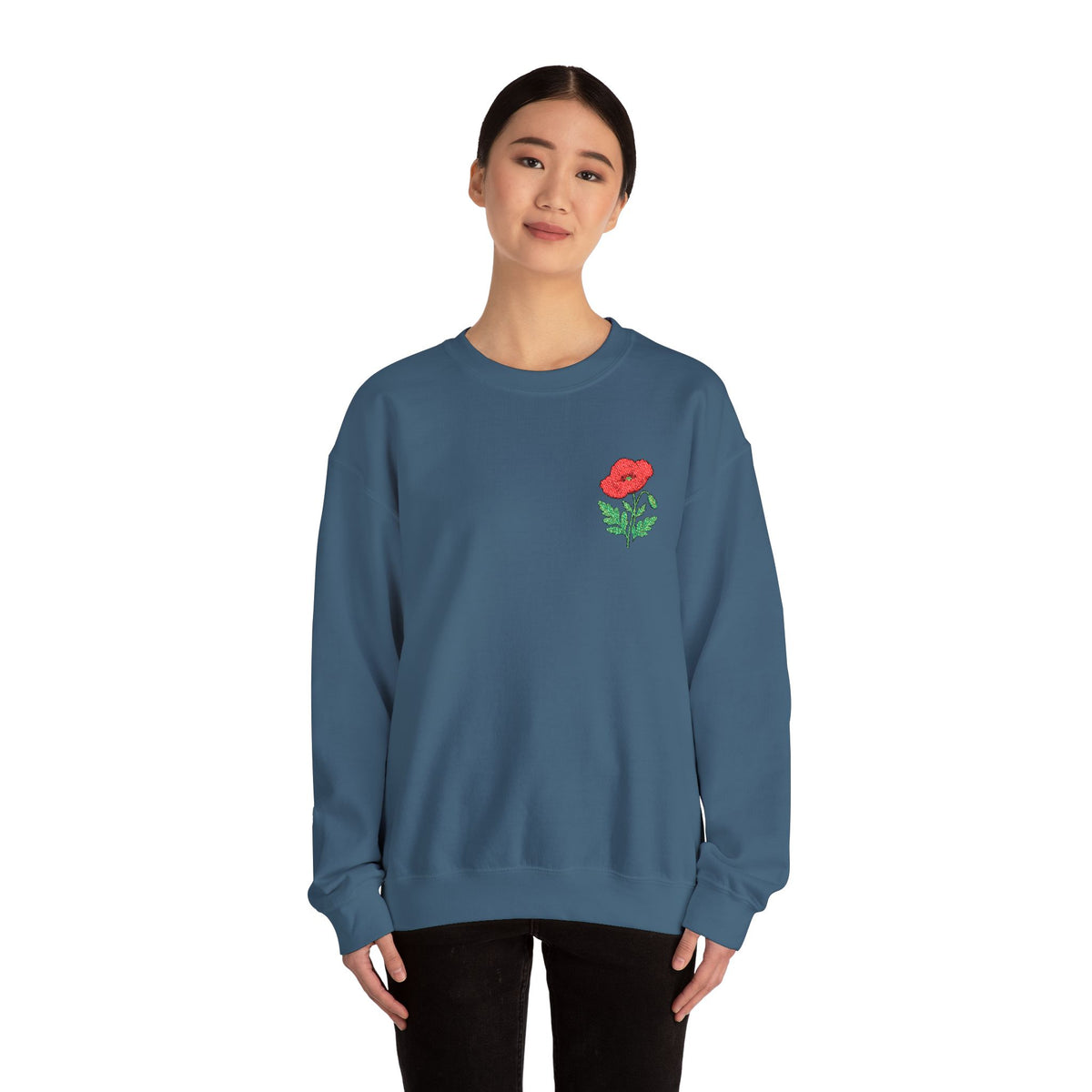 Unisex embroidered sweatshirt featuring a floral poppy design on the left chest, made by Printify.