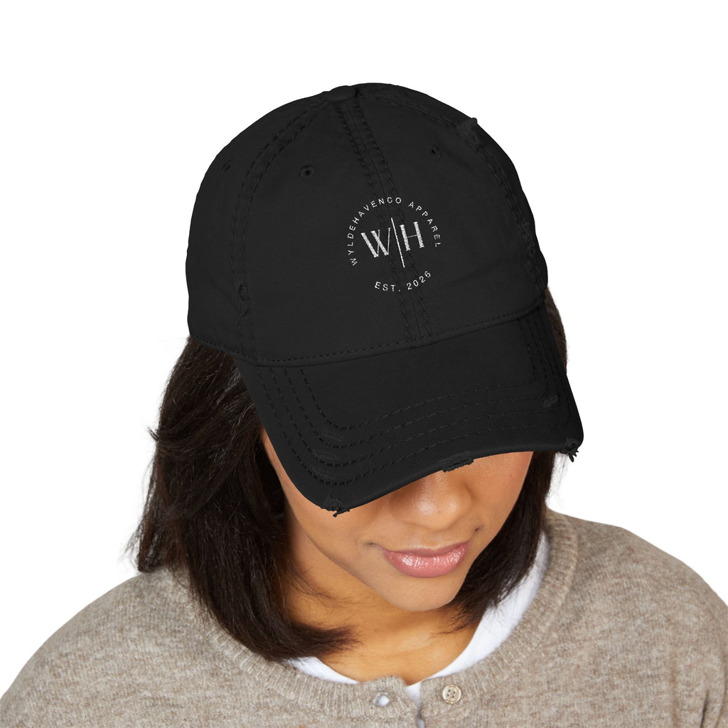 Distressed embroidered dad hat with vintage washed finish, casual baseball cap style from Printify.