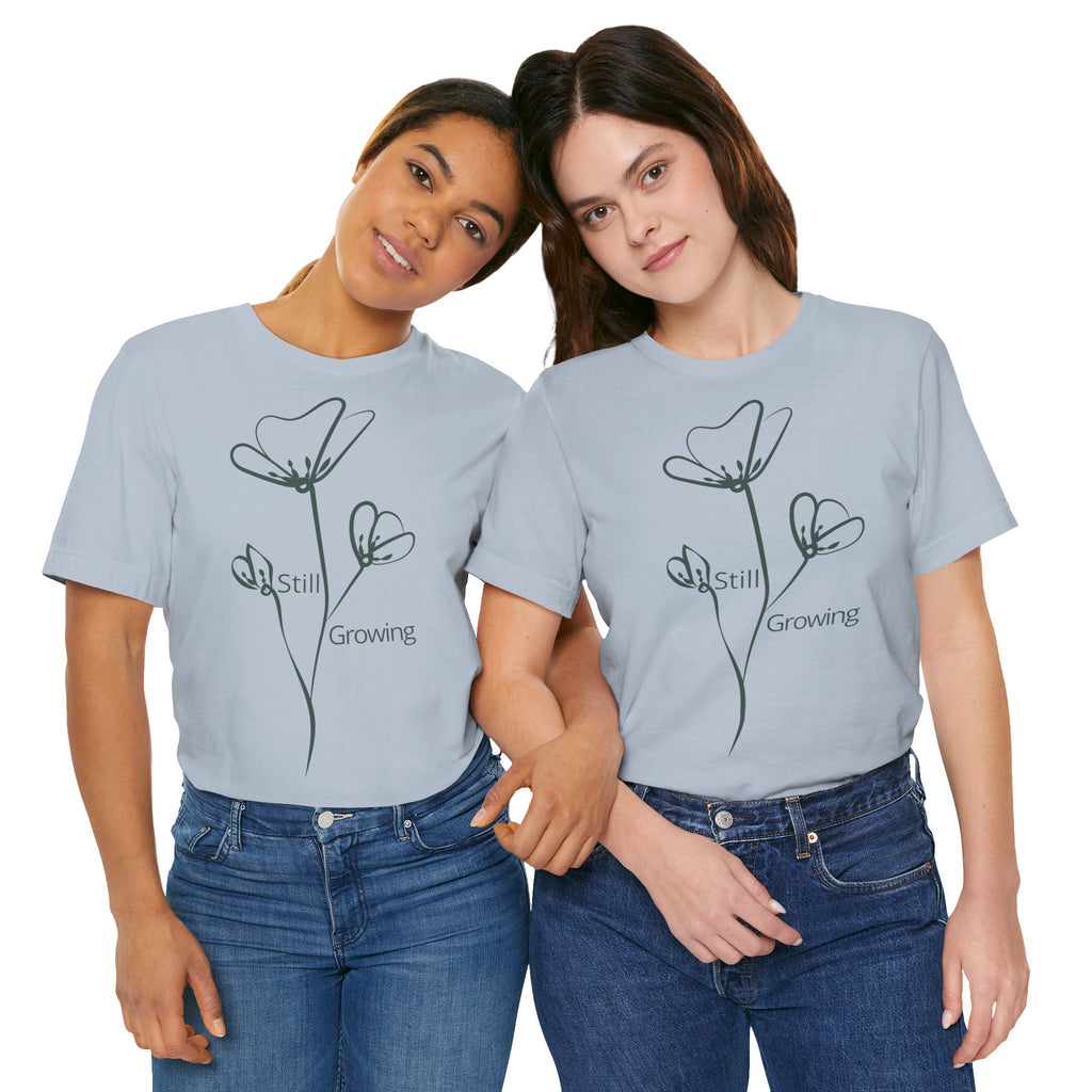 Still Growing floral print T-shirt by Printify featuring a minimalist inspirational design on a comfortable casual tee.