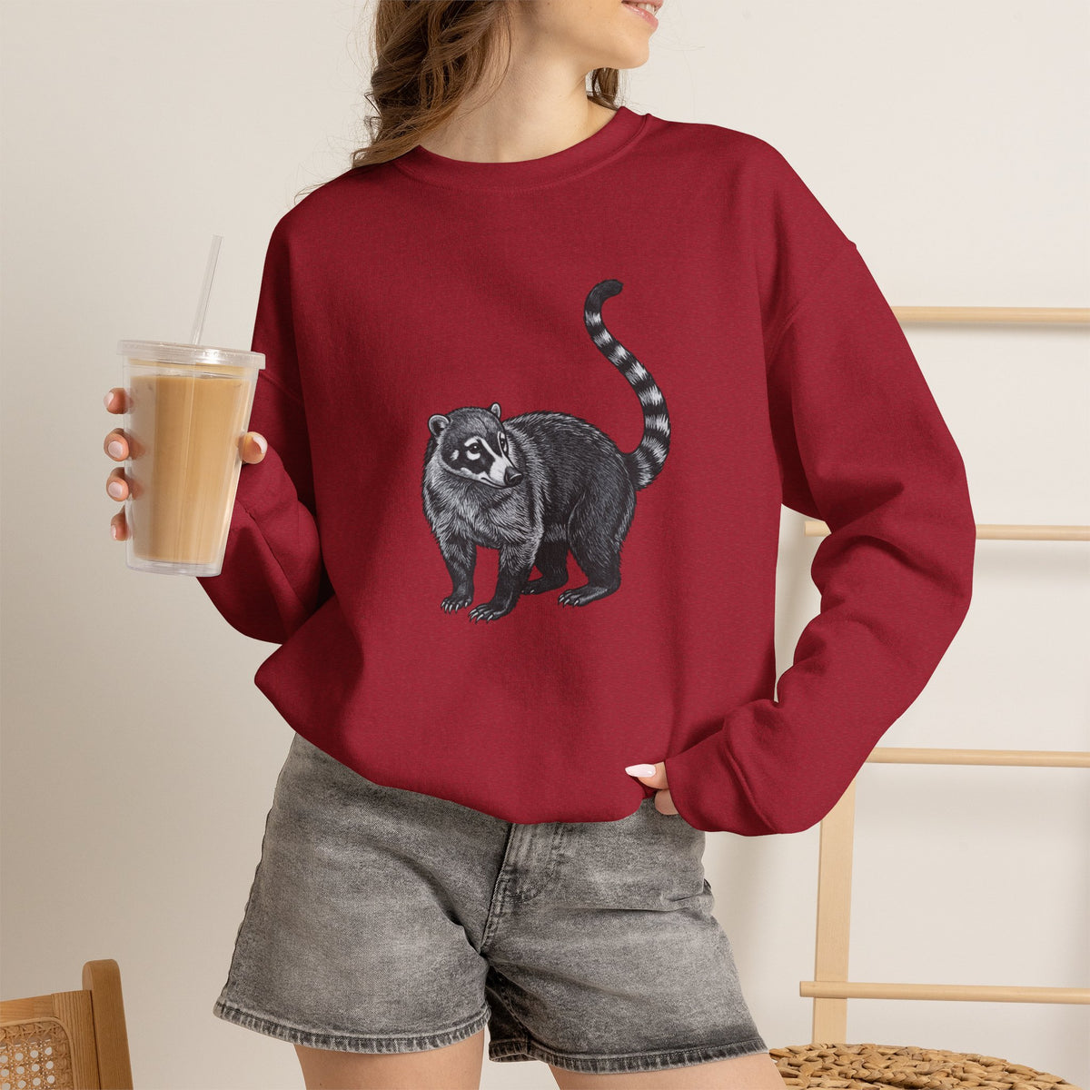 Coati graphic sweatshirt from Wyldelife Collection by Printify featuring wildlife art design on a comfortable sweatshirt.