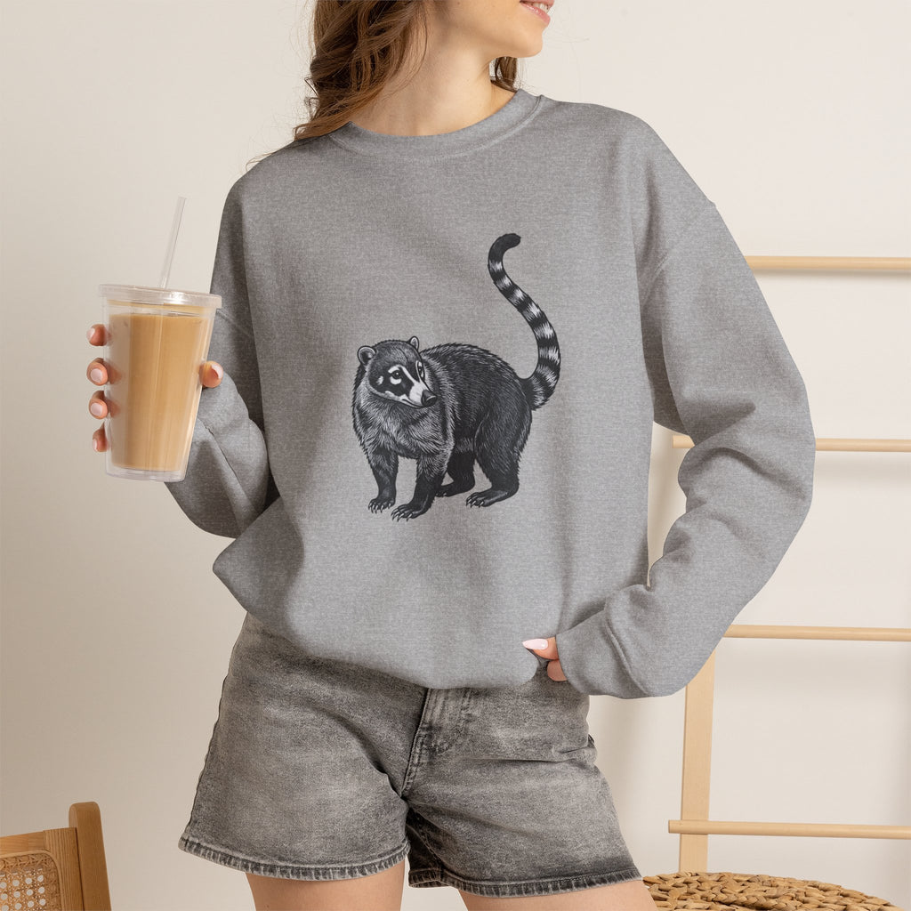 Coati graphic sweatshirt from Wyldelife Collection featuring original wildlife art, made by Printify, with detailed coati illustration on soft fabric.