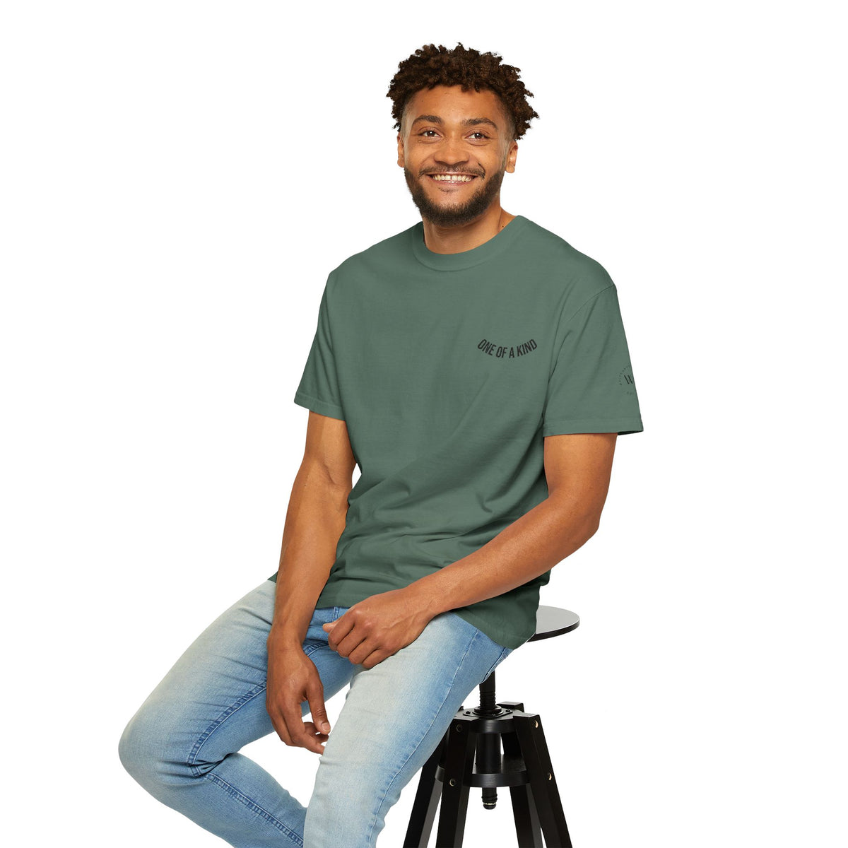 Black "One of a Kind" Chest Logo T-Shirt by Printify, featuring a minimalist logo print on the front.