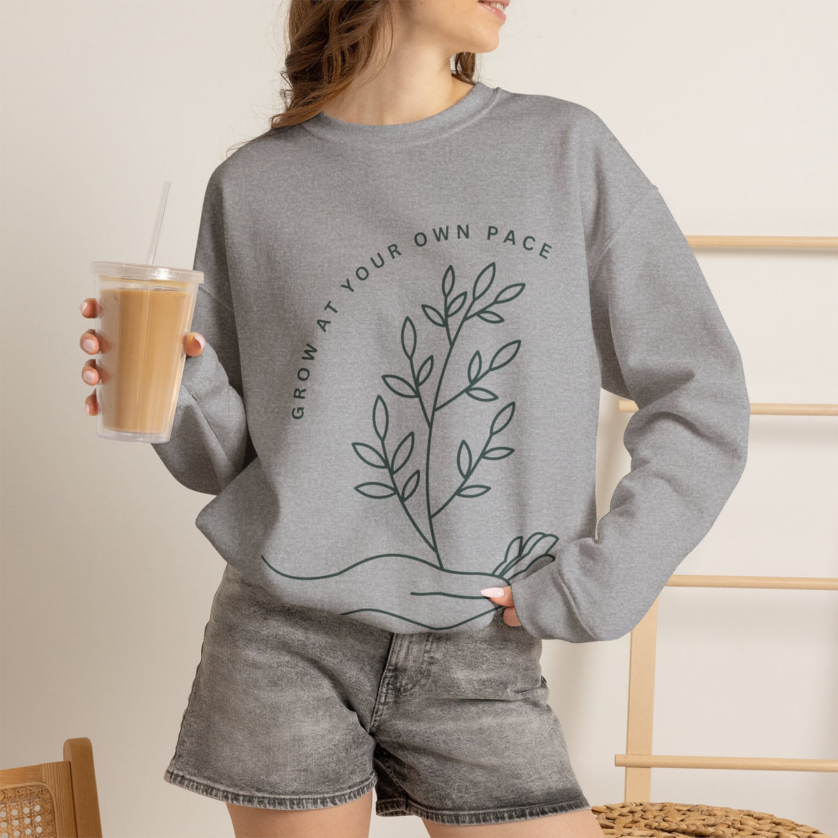 Printify Grow At Your Own Pace crewneck sweatshirt featuring minimalist line art design on soft, comfortable fabric.