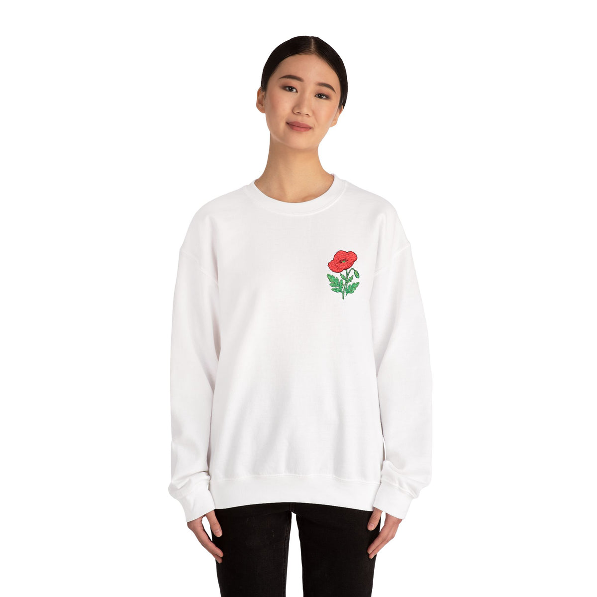Unisex embroidered sweatshirt with floral poppy design on the left chest, made by Printify.